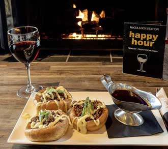 A meal by the cozy fireplace.